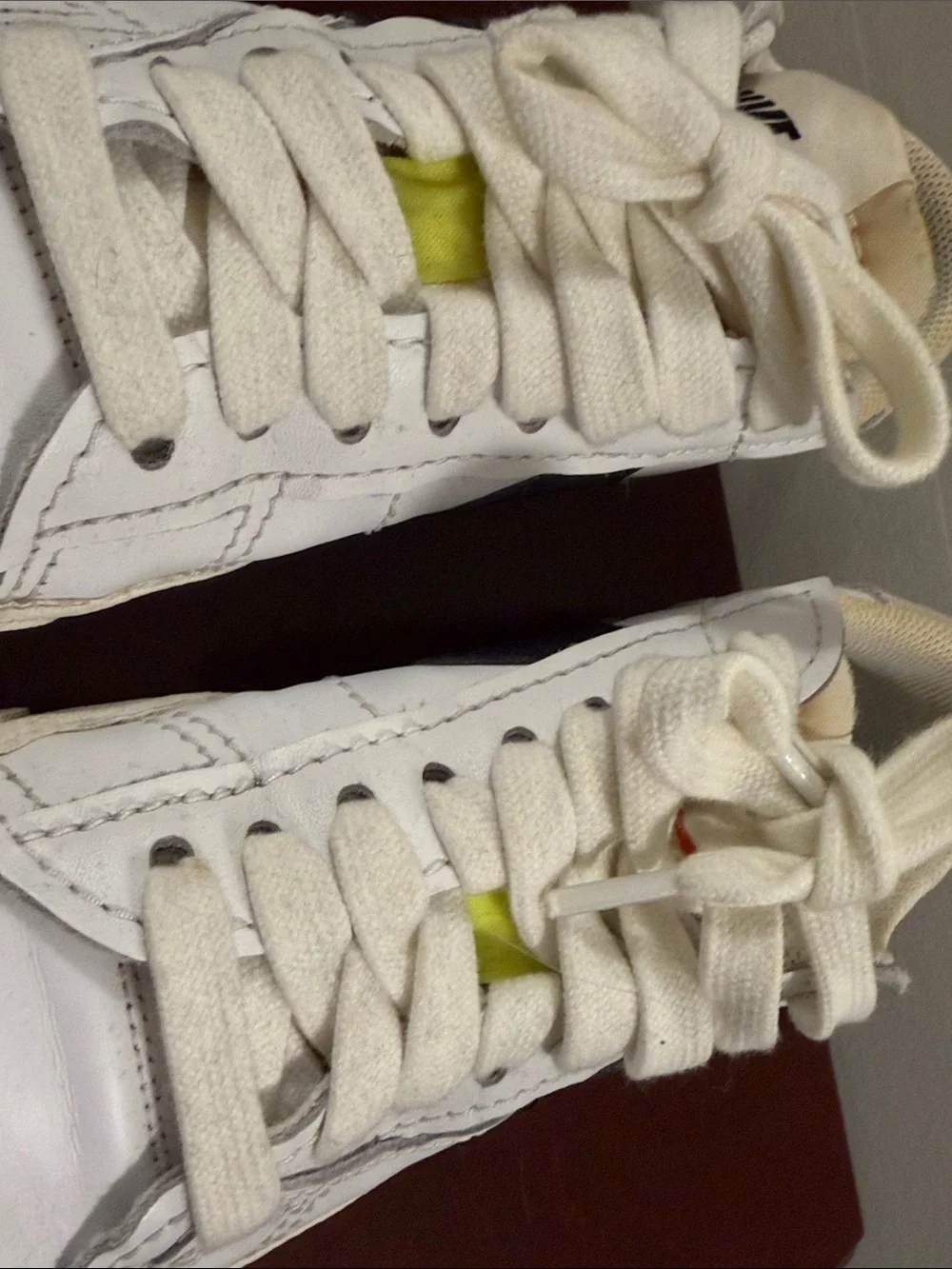 Nike White Sneakers with Black Swoosh and Cream Sole